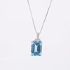 Emerald-Cut Blue Topaz and White Lab-Created Sapphire Pendant in Sterling Silver