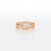 0.40 CT. T.W. Quad Princess-Cut Diamond Frame Twist Shank Bridal Set in 10K Gold