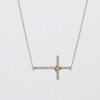 0.08 CT. T.W. Diamond Sideways Cross with Heart Necklace in Sterling Silver and 10K Gold