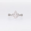 0.115 CT. T.W. Pear-Shaped Multi-Diamond Frame Twist Shank Promise Ring in Sterling Silver