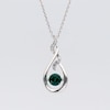 Unstoppable Love™ 5.0mm Lab-Created Emerald and White Lab-Created Sapphire Twist Teardrop Pendant in Sterling Silver