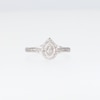 0.15 CT. T.W. Pear-Shaped Multi-Diamond Double Frame Split Shank Promise Ring in 10K White Gold