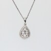 0.10 CT. T.W. Pear-Shaped Multi-Diamond Frame Pendant in Sterling Silver
