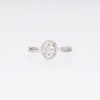 0.20 CT. T.W. Oval Multi-Diamond Frame Split Shank Promise Ring in Sterling Silver