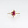 Oval Certified Ruby and 0.065 CT. T.W. Diamond Arabesque Frame Ring in 10K Gold